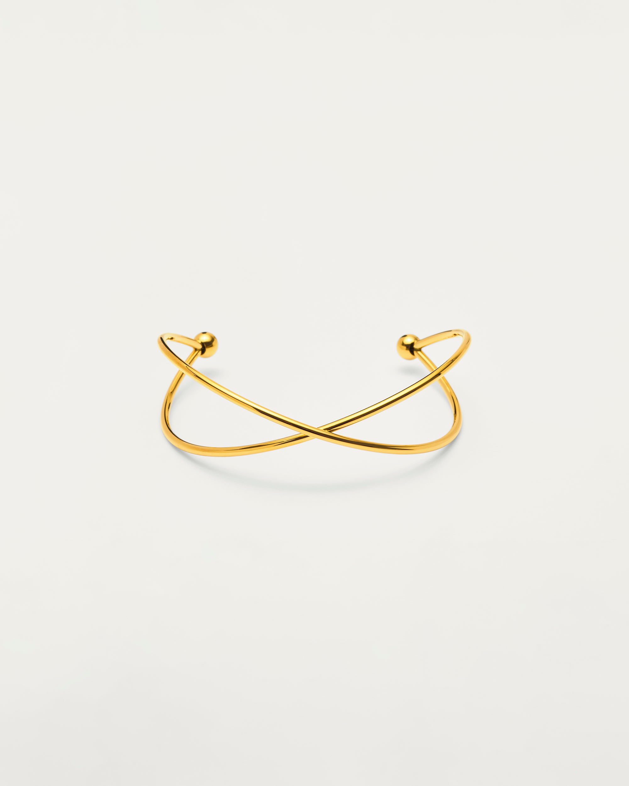 Gold Sculptural Cross Cuff Bangle