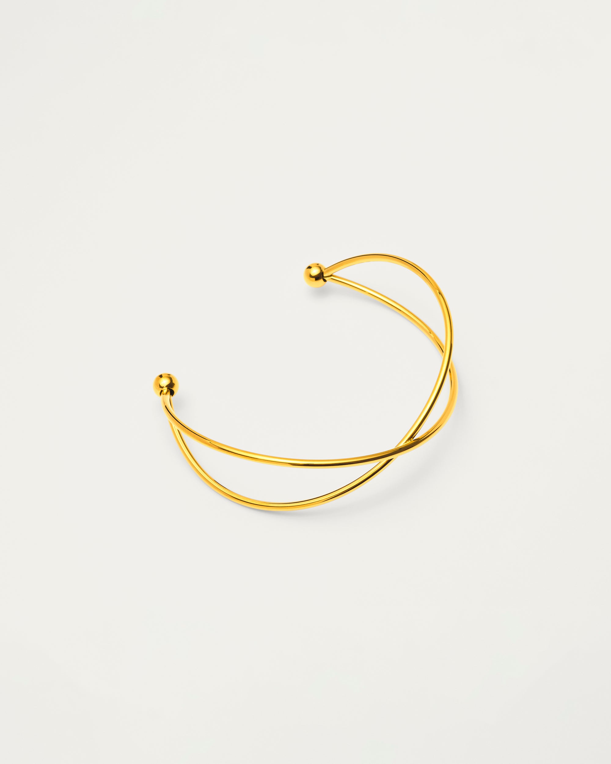 Gold Sculptural Cross Cuff Bangle