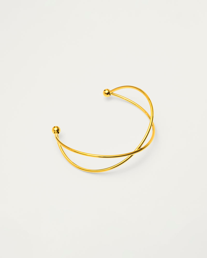 Gold Sculptural Cross Cuff Bangle