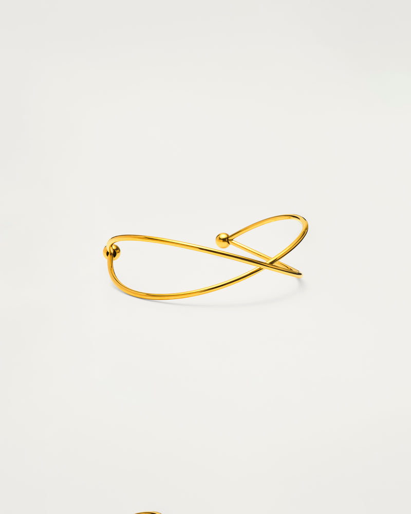 Gold Sculptural Cross Cuff Bangle